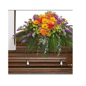 Radiant Medley Casket Spray Funeral Flowers